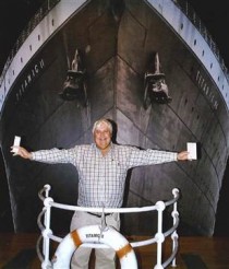PhotoCredit: Crook Publicity, Australian billionaire Clive Palmer poses in front of an artist impression of the Titanic ll at MGM Studios in Los Angeles, Calif.
