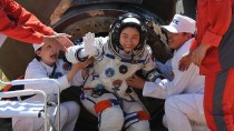 China astronauts back from space mission