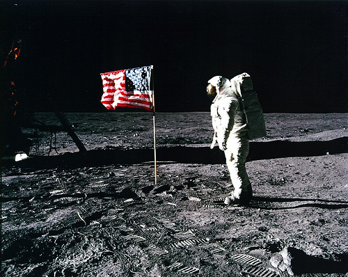 Armstrong on moon with the flag