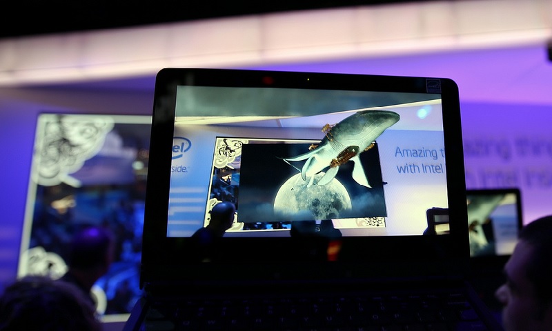 A Leviathan whale appears to leave the screen and fly over the crowd as a part of augmented reality demonstration